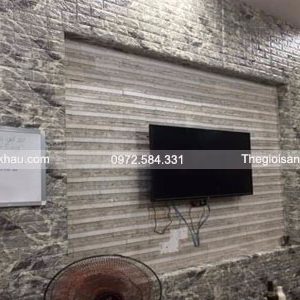 Su dung xop dan tuong 3d van dan mau den cho khong gian phong khach